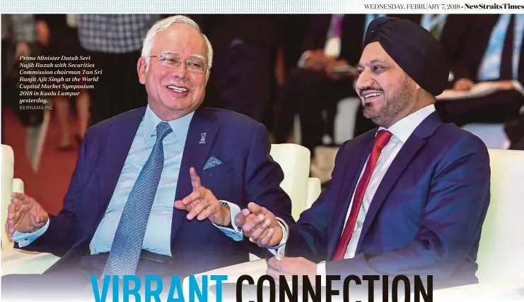  ?? BERNAMA PIC ?? Prime Minister Datuk Seri Najib Razak with Securities Commission chairman Tan Sri Ranjit Ajit Singh at the World Capital Market Symposium 2018 in Kuala Lumpur yesterday.