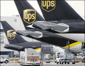  ?? DAVID R. LUTMAN / SPECIAL TO THE AJC ?? United Parcel Services has headquarte­rs in Sandy Springs. The package delivery company’s stock realized a 7.2 percent jump after the November election.