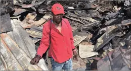  ?? PICTURE: JASON BOUD ?? Zamile Mawu stands at the spot in Imizamo Yethu where his shack was destroyed.