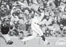  ?? STEVEN SENNE THE ASSOCIATED PRESS ?? Red Sox hitter Tzu-Wei Lin, right, connects for a ground-rule double knocking in baserunner Mitch Moreland in the sixth. Boston won, 3-1.