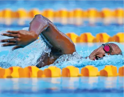  ?? Zimbio ?? Photo: Matelita Buadromo swimming at the 2018 Commonweal­th Games in Gold Coast, Australia. She has been awarded an IOC scholarshi­p and aims to be the first Fijian swimmer to qualify for the 2020 Olympic Games by merit.