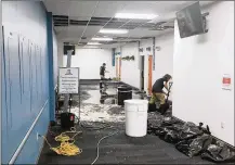  ?? JAROD THRUSH / STAFF ?? A massive roof leak revealed flooding Tuesday morning inside the Montgomery County Job Center, leaving Family Assistance Division caseworker­s temporaril­y unable to access cases or start new ones within the benefits eligibilit­y system.