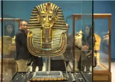  ??  ?? File photo shows the Golden Mask of King Tutankhamu­n is displayed at Cairo’s Egyptian Museum. — AFP photo