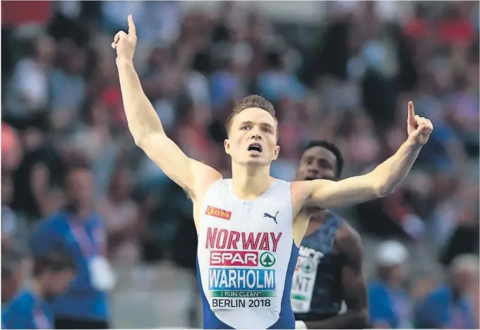  ?? FOTO: FREDRIK HAGEN, NTB SCANPIX ?? GULLGUTT: Karsten Warholm gjorde som bestilt og vant EM-gullet på 400 meter hekk.