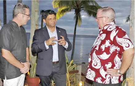  ?? Photo: OFFICE OF THE ATTORNEY GENERAL ?? Outrigger Resorts vice president Sales and Marketing Mark Simmons, Attorney-General Aiyaz Sayed-Khaiyum and Outrigger general manager Peter Hopgood during the Corporate Christmas cocktail at the Outrigger Fiji Beach Resort on Coral Coast on Saturday...