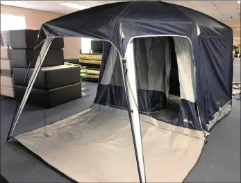  ??  ?? A large quantity of camping gear, including tents, will be among the lots offered in Bidway Auction House’s year-end auction in Woodstock on Wednesday.