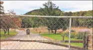  ?? Michelle Tuccitto Sullo / Hearst Connecticu­t Media ?? A fence blocks the main entrance to Sleeping Giant State Park in Hamden, which was damaged by a tornado in May. State officials do not have an estimate for when the park will reopen, and it will remain closed for the fall foliage season.