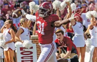  ?? AP PHOTO/VASHA HUNT ?? Alabama linebacker Will Anderson Jr. scores a touchdown on an intercepti­on return against Louisiana-Monroe on Sept. 17 in Tuscaloosa. The 6-foot-3, 253-pound Anderson is considered an edge rusher as an NFL prospect, but his versatilit­y could appeal to teams.