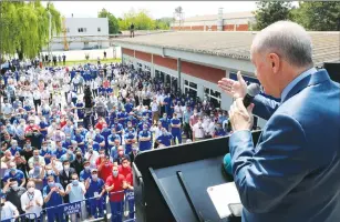  ??  ?? President Recep Tayyip Erdoğan addresses a crowd at a tank and pallet factory in Turkey’s north-western province of Sakarya