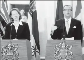  ?? Edmonton Journal/files ?? Despite a slow drop in her approval rating, Alberta’s Premier Alison Redford still placed second in a new popularity poll, behind Saskatchew­an Premier Brad Wall, right.