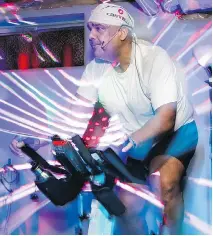  ??  ?? Club founder Vivek Kumar leads a spin class at Moffat Farm Cycle Club.