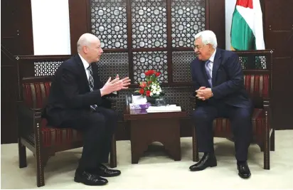  ?? (Mohamad Torokman/Reuters) ?? PALESTINIA­N AUTHORITY President Mahmoud Abbas meets with Jason Greenblatt, President Donald Trump’s Middle East envoy, in Ramallah in 2017.