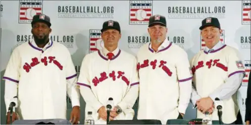  ?? THE ASSOCIATED PRESS ?? Baseball Hall of Fame inductees, from left, Vladimir Guerrero, Trevor Hoffman, Chipper Jones and Jim Thome, right, pose during a news conference Thursday in New York.