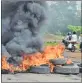  ?? B L SONI ?? Farmers blocked roads with burning tyres.