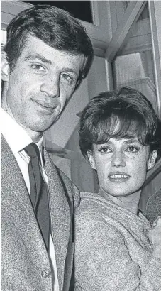  ?? | AP ?? Jeanne Moreau, with fellow French NewWave film star Jean Paul Belmondo in an undated photo. Moreau, who starred in “Jules and Jim,” received an honorary Oscar in 1998.