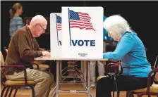  ?? AFP ?? Residents vote at the Greensprin­g Retirement Centre in Fairfax, Virginia, yesterday.