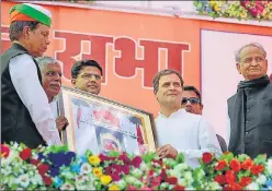  ?? PTI ?? Rajasthan Congress chief Sachin Pilot (third from left), party president Rahul Gandhi and former Rajasthan CM Ashok Gehlot during a public meeting in Chittorgar­h, Rajasthan, on Saturday.
