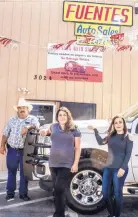  ?? GLEN ROSALES/FOR THE JOURNAL ?? José Fuentes and his daughters Janet Fuentes, left, and Cynthia Fuentes run the South Broadway Fuentes Auto Sales dealership that is celebratin­g its first anniversar­y.