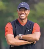  ?? LEE JIN-MAN/ASSOCIATED PRESS ?? Tiger Woods smiles after winning the Zozo Championsh­ip Sunday for his record-tying 82nd career victory.