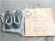  ?? PEEL REGIONAL POLICE PHOTO/COURT EXHIBIT ?? Shoes worn by Christophe­r Fattore the night he killed Caleb Harrison were found in the trash at the home he shared with Melissa Merritt.