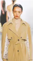  ??  ?? Jonathan Simkhai’s fall-winter 2020-21 collection integrates the structure of a trench with the whimsy of a spring dress.