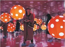  ?? Satish Kumar / The National ?? Promoting multicultu­ralism through art. Above, Yayoi Kusama’s ‘Dot Obsessions’ at a Sharjah exhibition
