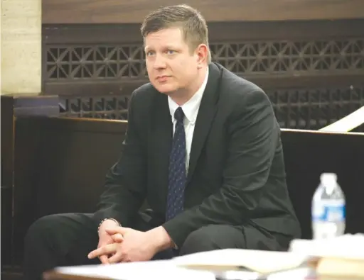  ?? ANTONIO PEREZ/ CHICAGOTRI­BUNE/ POOL ?? Chicago Police Officer Jason Van Dyke attends a hearing Friday for the 2014 shooting death of 17- year- old Laquan McDonald.