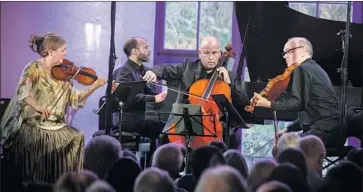  ?? Allen J. Schaben Los Angeles Times ?? MARGARET BATJER, violin, Orion Weiss, piano, Robert deMaine, cello, and Paul Neubauer, viola, perform.