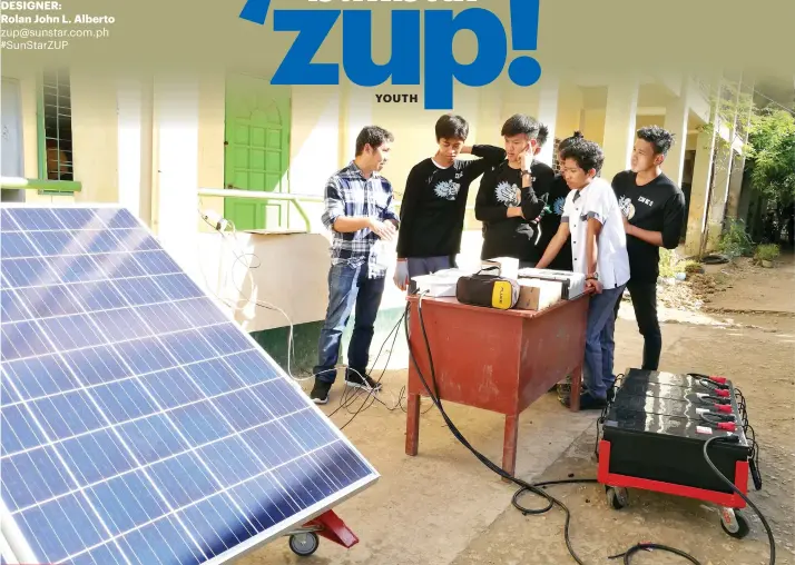  ?? CONTRIBUTE­D PHOTO ?? EMPOWERING GENERATION NEXT. Vivant Corp. planning and design engineer Raji Roullo (left) explains to the students how the solar power installati­on woks. The installati­on is part of the assistance that Vivant Foundation extended to the school to provide...