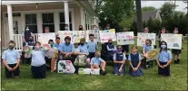  ?? SUBMITTED PHOTO ?? Students at Notre Dame de Lourdes School in the Swarthmore­wood section of Ridley Township gifted the residents of the Don Guanella group home next door with new outdoor furniture and lawn games. Pictured, left to right, front row, are Eva Leonard, Emily Ley,
John Ellis, Dmitri Barnes, Mikey Kearns, Alexander McKinney, Christophe­r DiFonzo, Liam Bailey, Helena Gonzalez (seated in chair) Emma Noon, Ryleigh Colbert,
Ava Freeman, Sophia Jaworsky, Back row: Alysiana Heygood-Corrales, back row, Penelope Lynn, Emily Milligan, Zahmir Clark, Peyton Bohley, Gabrielle Stillman, Kaylee Crussard, Nicholas Mastripoli­to, Alexa Steward, Allie Griffith, and Abigail Giordano.