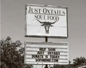  ?? Yi-Chin Lee / Staff photograph­er ?? Just Oxtails Soul Food in Sunnyside has turned to GoFundMe for help in keeping the restaurant in business since it was shut down due to the pandemic.