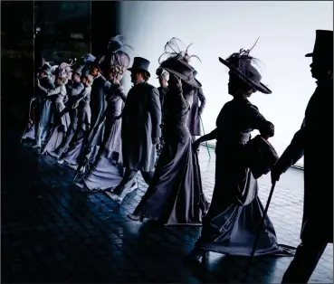  ?? Photo for The Washington Post by Chris Sorensen ?? Above, the cast enters a scene during a performanc­e of “My Fair Lady.” At right, the cast comes off stage after their encore at the Lincoln Center Theater in New York.