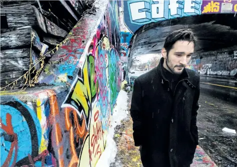  ?? DAVE SIDAWAY/POSTMEDIA NETWORK ?? Filmmaker Pascal Plante walks through an area of Montreal on Jan. 12, that was used in his first fictional feature film, Les faux tatouages (Fake Tatoos). Plante’s film will be included at Slamdance, a sort of off-Sundance film festival.