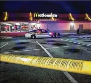  ?? JIM NOELKER/STAFF ?? A car that held a girl who had been shot drove to a McDonald’s parking lot on Salem Avenue in Trotwood to get help Wednesday evening.