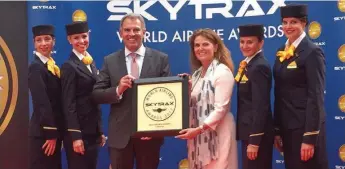  ??  ?? Lufthansa officials receiving the Europe Best Airline Award