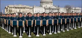 ?? GABRIELLA DEMCZUK / NEW YORK TIMES ?? A phalanx of life-sized cutouts of Mark Zuckerberg stand Tuesday outside the U.S. Capitol. Activist group Avaaz put them on display to call on the Facebook founder to fight the “fake news” problem afflicting social media.