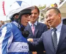  ?? RACINGFOTO­S ?? Winner: Ryan Moore (left) with Vichai Srivaddhan­aprabha after Beat The Bank win