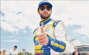  ?? Logan Riely / Getty Images ?? Chase Elliott has two wins and nine top-10 finishes to lead all drivers in the Cup Series points standings heading into Sunday’s race at Atlanta Motor Speedway.