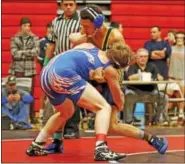  ?? KIRK NEIDERMYER - DIGITAL FIRST MEDIA ?? Oley Valley’s Dylan Lambert tries to take down Muhlenberg’s Stephan Mayo during the Berks individual wrestling tournament at Reading High School in Reading on Saturday.