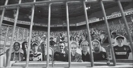  ?? REUTERS ?? Cardboard cutouts of Borussia Moenchengl­adbach fans occupy seats in the stands during Sunday’s Bundesliga match against Union Berlin at Gladbach’s Borussia Park.