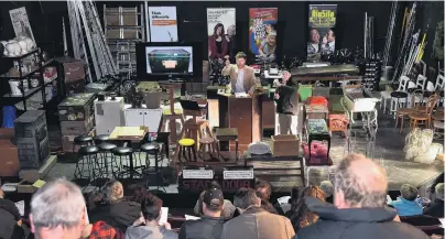  ?? PHOTOS: PETER MCINTOSH ?? Directing the show . . . Hayward Auction House owner John More takes bids for Fortune Theatre items on Saturday.