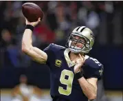  ?? GETTY IMAGES ?? Drew Brees goes into Sunday’s regular-season finale at Tampa Bay with a completion percentage of 71.9, safely ahead of Sam Bradford’s 2016 record (71.7).