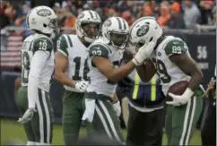  ?? NAM Y. HUH - THE ASSOCIATED PRESS ?? New York Jets tight end Chris Herndon (89) celebrates a touchdown reception with his teammates during the second half of an NFL football game against the Chicago Bears Sunday, Oct. 28, 2018, in Chicago.
