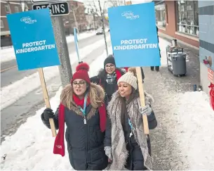  ?? RICK MADONIK TORONTO STAR FILE PHOTO ?? Teachers picket outside Our Lady of Lourdes Catholic School on Sherbourne Street on Jan. 21. The ETFO has said it will begin striking two days a week, starting next week, if no deal is reached.