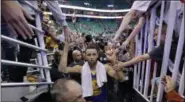  ?? RICK BOWMER — THE ASSOCIATED PRESS ?? Golden State Warriors guard Stephen Curry celebrates with fans as he leaves the court after Game 4of the NBA basketball second-round playoff series Monday in Salt Lake City. The Warriors won 121-95.