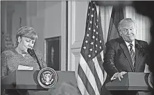  ?? [STEPHEN CROWLEY/THE NEW YORK TIMES] ?? President Donald Trump and German Chancellor Angela Merkel hold a joint news conference at the White House on Friday. The chilly meeting showcased the leaders’ disagreeme­nts. Then on Saturday morning, Trump criticized Germany for paying too little to...