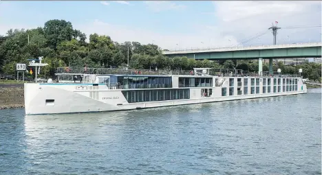  ?? AARON SAUNDERS ?? The Crystal Bach, docked here in Cologne, Germany, together with sister Crystal Mahler, are Crystal’s first purpose-built river cruise ships on the rivers of Europe. The cruise line makes luxury a priority on its unique new river ships, with lavish...