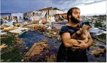  ?? LANNIS WATERS / THE PALM BEACH POST 1992 ?? Homes in Florida City, including in the Goldcoaste­r Mobile Home Park, were destroyed when Hurricane Andrew hit in 1992. The Category 5 storm caused $26.5 billion in economic losses. That figure would be far greater today.