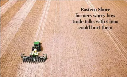  ?? JERRY JACKSON/BALTIMORE SUN PHOTOS ?? Soybean farmer Jason Scott plants in a Dorchester County field. He worries how trade wars could affect the price of his crop.