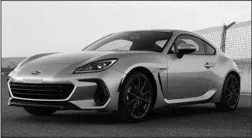  ?? SUBARU OF NORTH AMERICA VIA ASSOCIATED PRESS ?? The 2024 Subaru BRZ is a lightweigh­t sport coupe that excels on curvy roads thanks to its agile handling and quick steering.